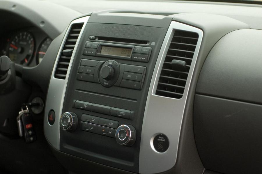  Nissan Frontier 2009 года  (фото 37 из 65)